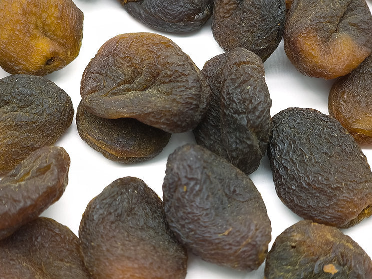 A close up of whole apricots