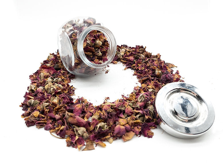 A jar filled with Rose Flowers