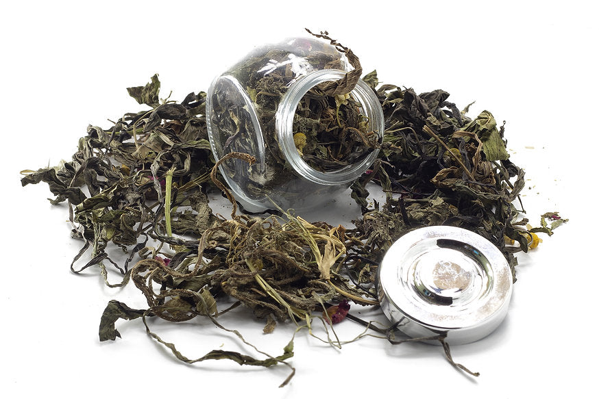 A jar filled with Chamomile & Lavender Leaves