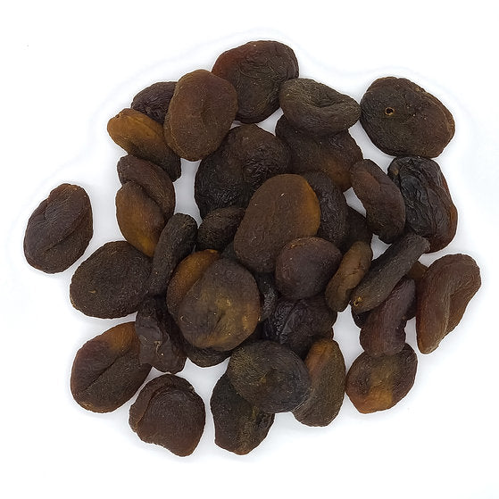 A pile of whole apricots