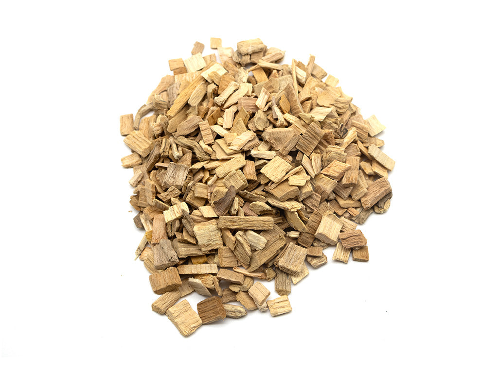Pile of small beech chips on a white background