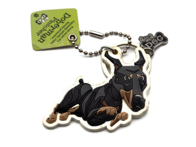 Keychain with a Doberman pinscher design on a white background
