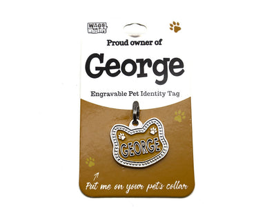 Engravable pet identity tag for George on a brown card with Wag Whiskers branding.