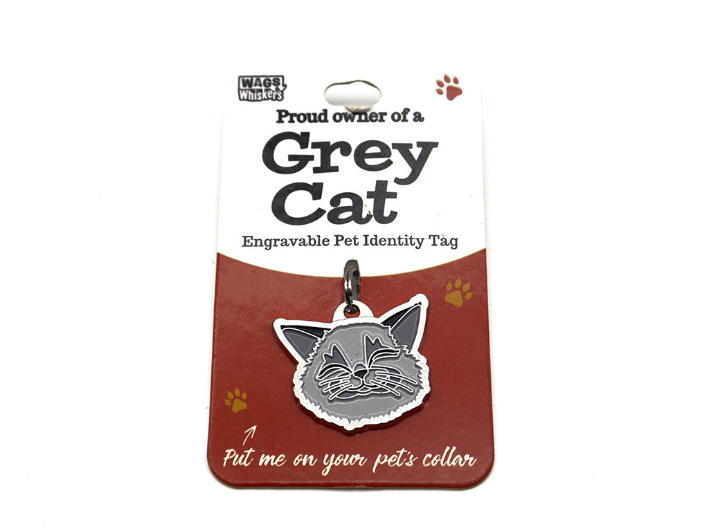 Engravable pet identity tag for Grey Gaton a red card with Wag & Whistle branding.