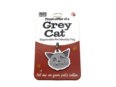 Engravable pet identity tag for Grey Gaton a red card with Wag & Whistle branding.