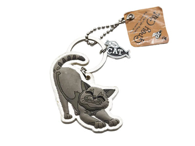 Cat-shaped keychain with a tag on a white background