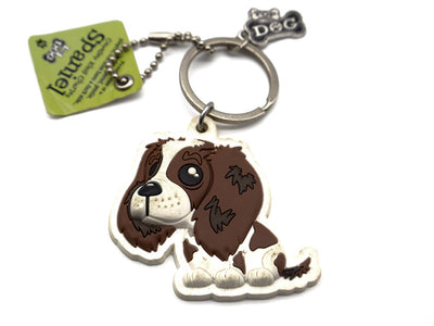 Dog-shaped keychain with a tag on a white background