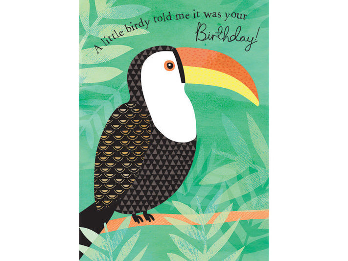Birthday card with a toucan illustration and text on a green leafy background