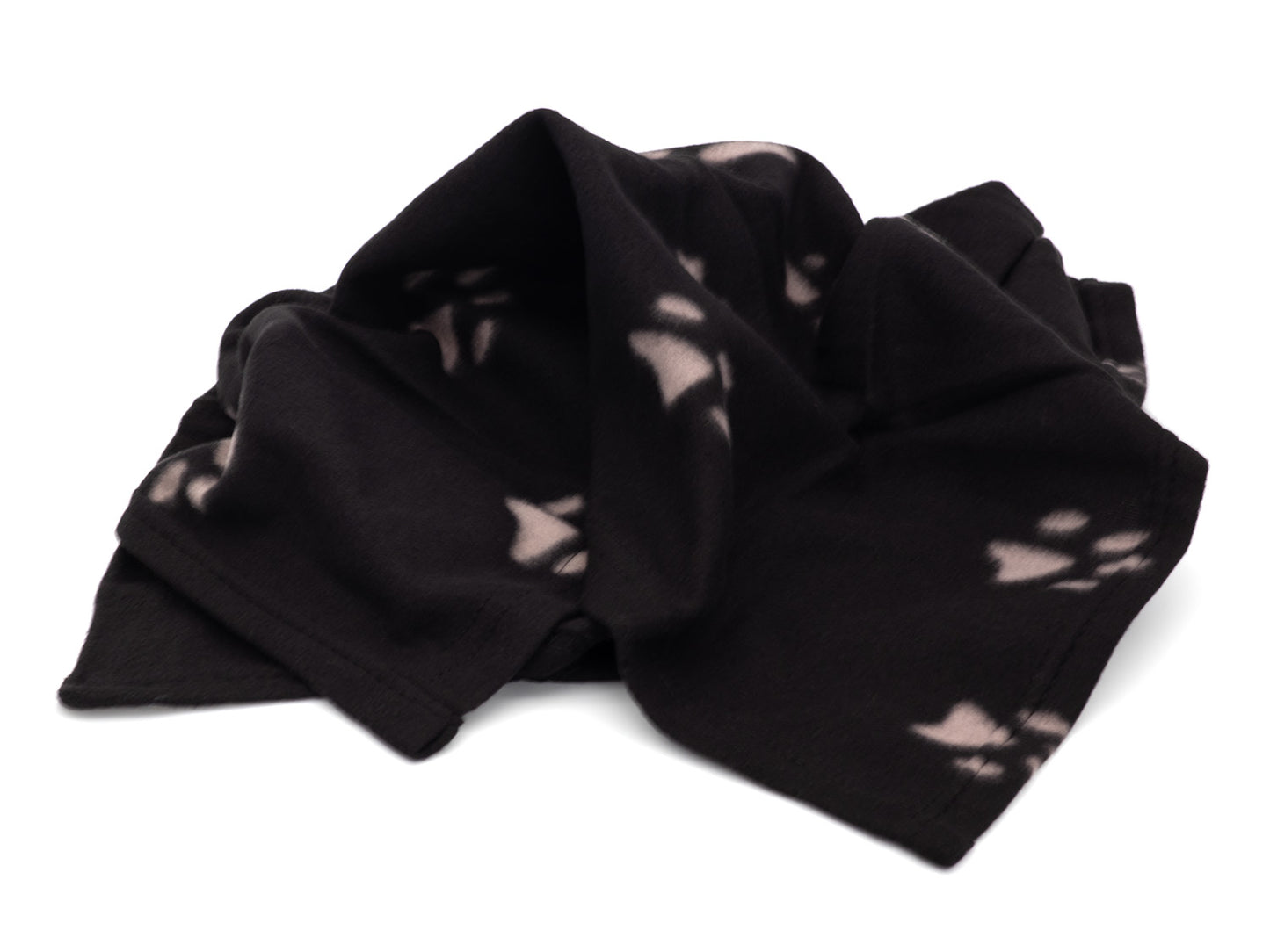 Black fabric with white abstract patterns on a white background