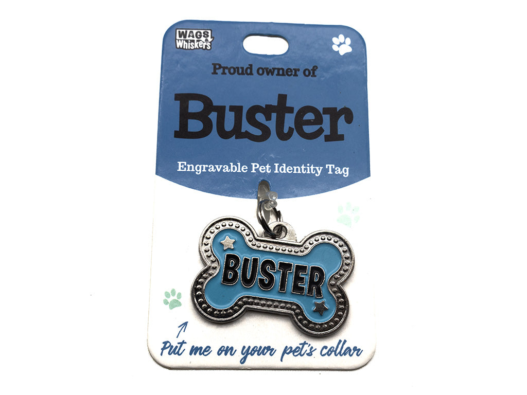Engravable pet identity tag for a dog named 'Buster' on a blue card with 'Wags & Whiskers' branding.