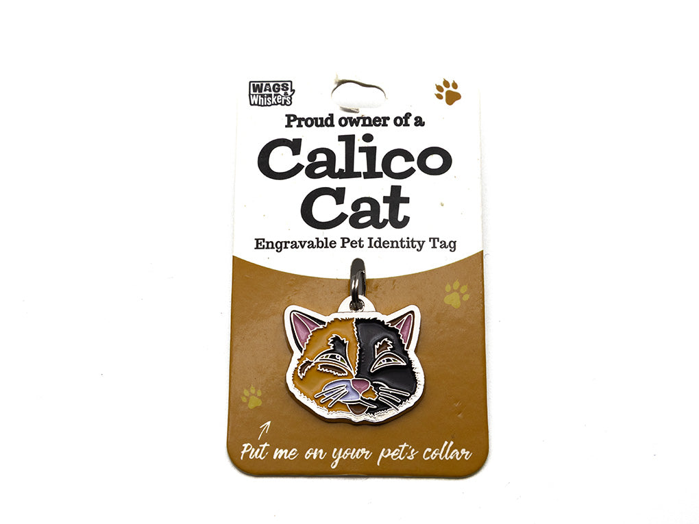 Engravable pet identity tag for a calico cat on a white background