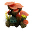 Decorative aquarium scene with coral and plants on a white background