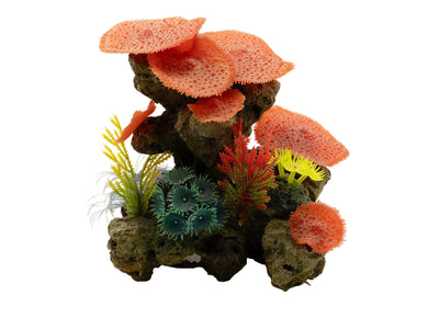 Decorative aquarium scene with coral and plants on a white background
