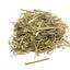 Pile of natural dried green oat stems on a white background, small animal forage treat
