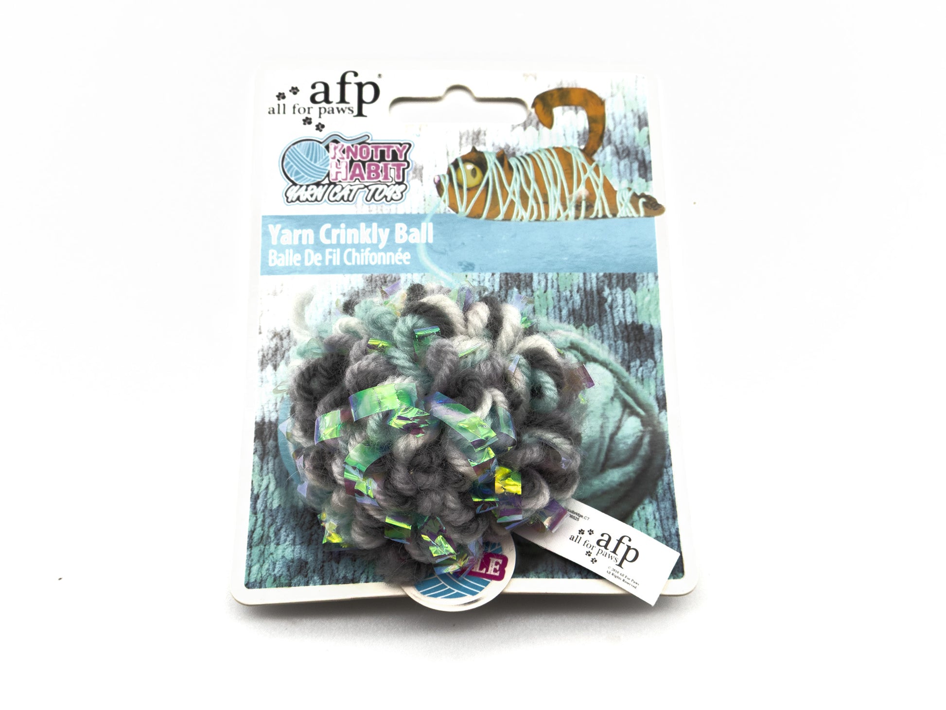 A packaged afp All For Pets Yarn Grinky Ball in gray and green, shown on its retail blister card against a white background.