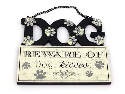 Decorative sign with 'Beware of Dog Kisses' text and paw prints on a white background
