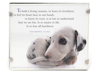 Plaque with a Dalmatian puppy and a quote by Pam Brown on a white background