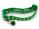 Green cat collar with paw prints and a bell on a white background