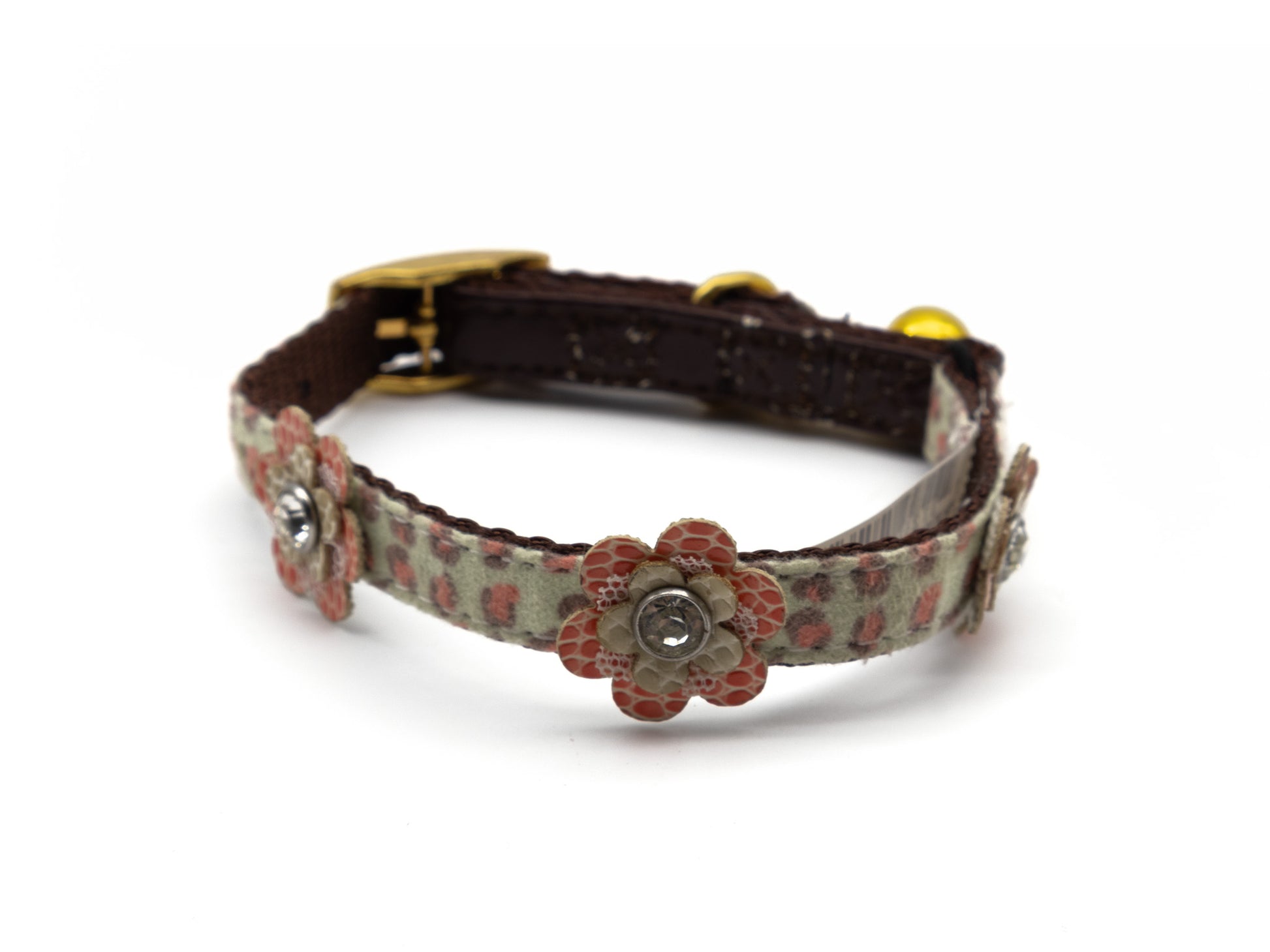 A leather collar with a dark brown strap, featuring a light green patterned fabric section decorated with pinkish-red flowers with silver centers, and gold-tone metal hardware.