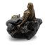 Bronze mermaid figurine sitting on a rock with a starfish, on a white background