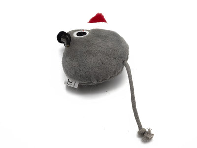 A gray plush toy shaped like a mouse with a long tail and a small red Santa hat, photographed on a white background.