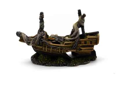 Decorative miniature boat with a white background