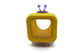 A yellow and purple retro television-shaped product, likely a toy or container, isolated on a white background.