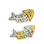 Two small fish-shaped enamel pins with fish skeleton designs, shown on a plain white background. One pin is yellow and white, and the other is yellow, light blue, and white.