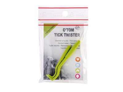 O'Tom Tick Twister in a clear plastic packaging with a white and green label, containing a bright green tick remover tool.